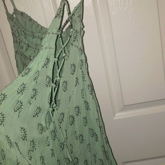 NWOT Free People  whimsical  dress with laces up the side.  Size M. NWOT - Picture 7 of 7